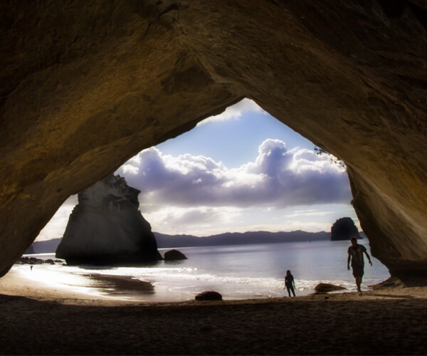 Cathedral Cove is a natural attraction on the Coromandel Peninsula in New Zealand. It has a unique arch rock formation connecting two gorgeous beaches